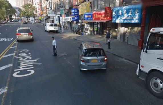 Chrystie Street is a major route to the Manhattan Bridge bike path. The bike lane fades quickly due to high automobile traffic, a sign of failure.
